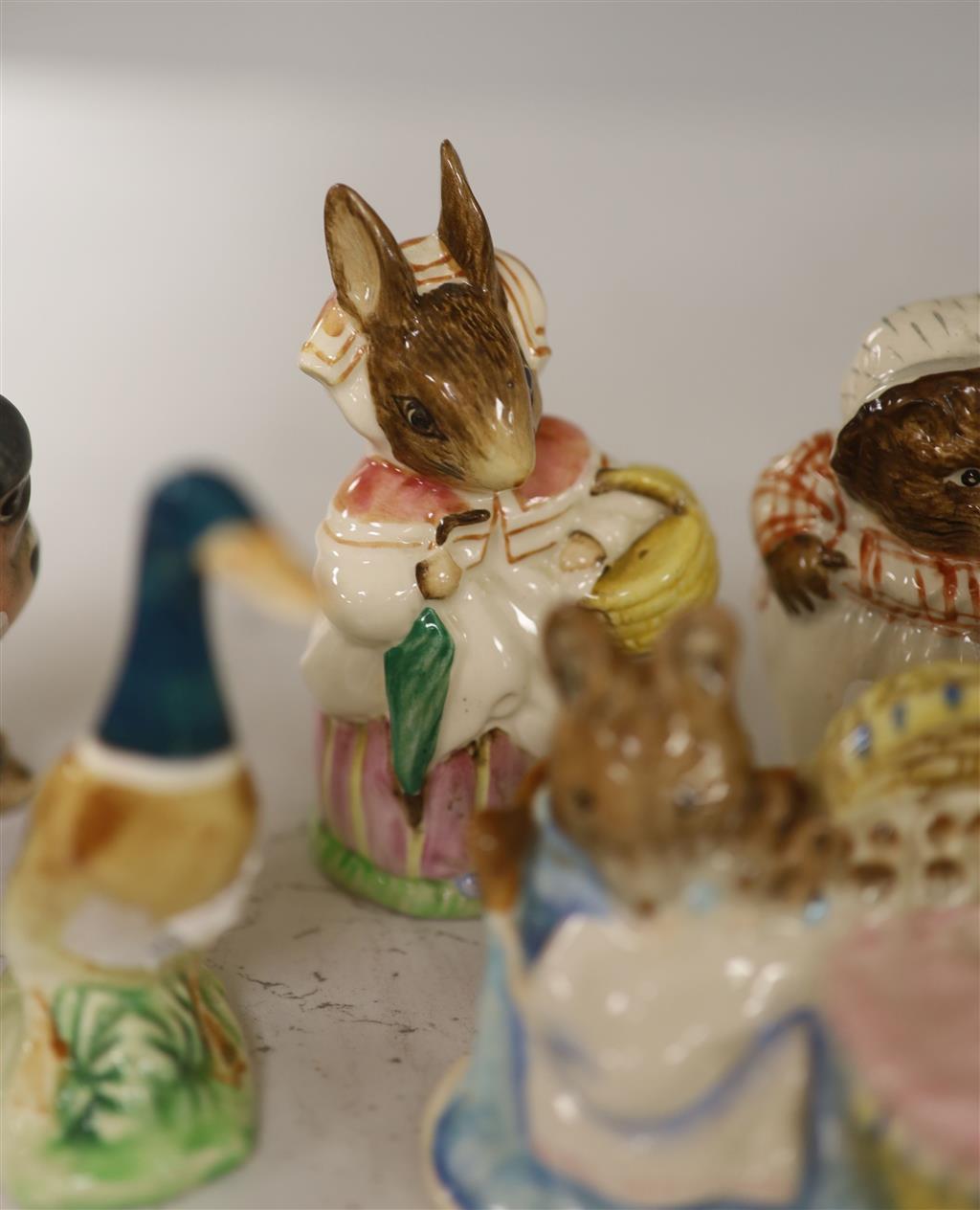 Seven Beswick Beatrix potter characters and five other ceramic models